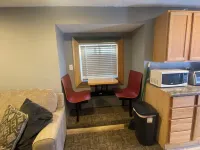 The Covered Porch Hideaway - Lakeside Tiny House Rental - Sleeps 4 Hotels in Rock County