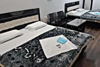 Goroomgo Madhu Palace Katra