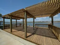 Canal Dock and Community Pool - Charming Coastal Escape