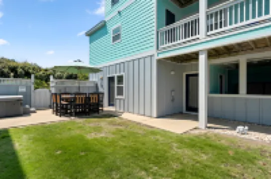 Spacious Living and Hot Tub Access - Serene Coastal Haven