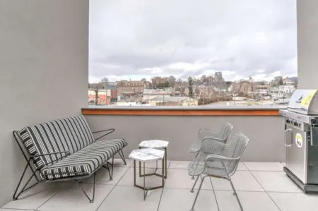 Rooftop Patio and Private Elevator - Stylish Townhome Retreat