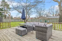 Charming Backyard Oasis with Fire Pit and Rec Room - Inviting Getaway