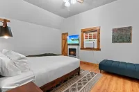 Cozy Creekside Cabin w Barrel Sauna, Covered Wraparound Deck - Pet Friendly!