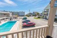 Private Balcony and Sparkling Pool - Charming Coastal Retreat Hotels near Beach Bookshop & Video