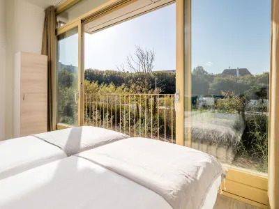 弗利辛恩靠近北海海灘的小屋 酒店