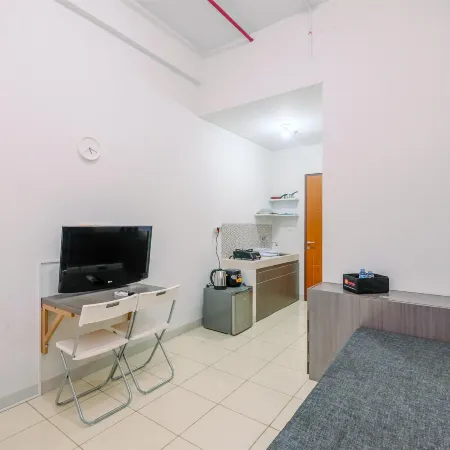 Comfortable and Minimalist Studio at Dave Apartment