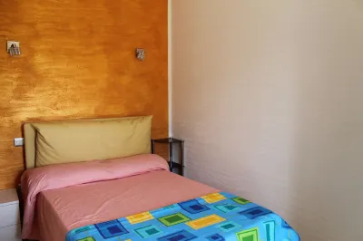 Room in Guest Room - S'Olivariu Village Affittacamere - Deluxe King Room Hotels in Carbonia