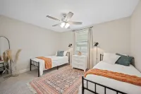 Modern 4-Bedroom Pool House w/ King Beds– 5 Minutes from Downtown!