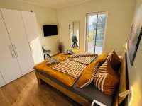 8P Holiday home "Seegelblick" in the first row of the lake with sauna, fireplace & wallbox Hotel a Pouch