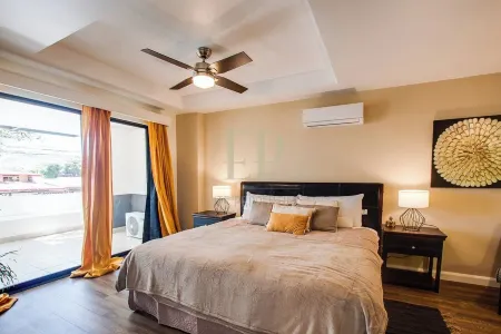 Urban Oasis in Santa Ana Centro: 2BR & Terrace near Everything