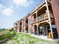 Modern apartment overlooking the dike, in Wremen Hotels in Wremen