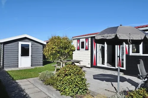 Chalet Florence 5 , 6- Persoons met Veel Privacy; Huisdiervrij,ruime Tuin Hotels in Serooskerke