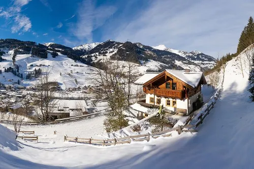detached holiday house located forest edge, elevated above Großarl-Valley