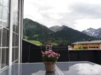 Apartment with roof terrace, washing machine, cable car included in summer.