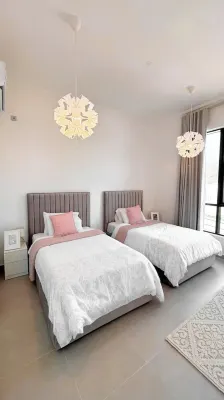 Sand : A Cozy Coastal Escape, & Sea : A Refined Coastal Retreat Hotels near Jebel Sifah Marina