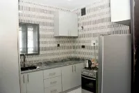 Slim Anyaiwe Apartments Hotels in Agbor