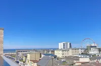 Roof top lighthouse and sea view