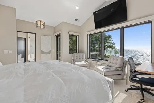 Lakefront Luxe /  Heated Pool • Game Room • Workstations