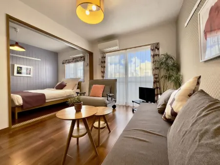 Luana Lea Karate Kaikan Mae Отели рядом с достопримечательностью «Toyosaki Churasun»