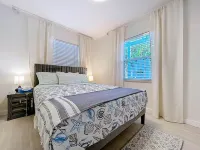 Charming Ground Level Resort Style 3unit condo unit B a few steps from the beach