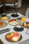 Binn Hotel - servizio colazione