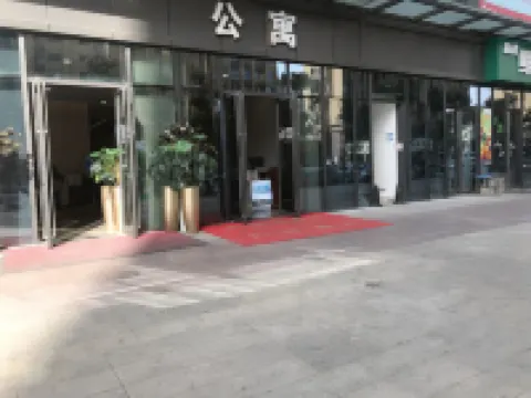 Wanjia Hotel (Fuyang Baolong City Plaza)
