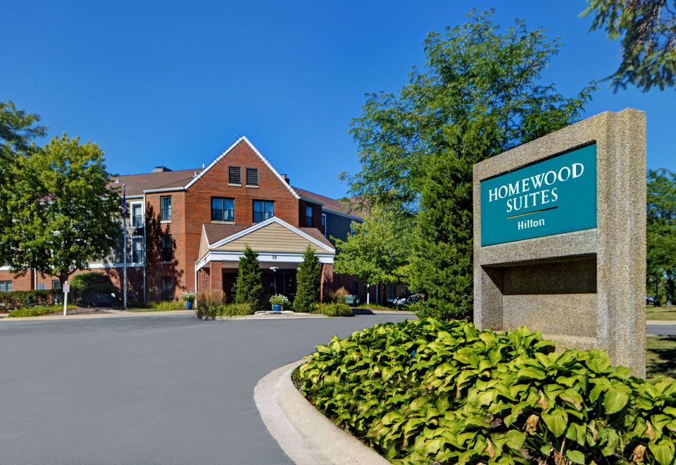 "a brick building with a sign that reads "" homewood suites "" prominently displayed on the front of the building" at Homewood Suites by Hilton Chicago-Lincolnshire