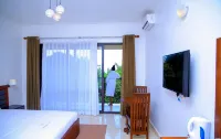 Greenyard Beach Hotel Hotels near Kyewaga Central Forest Reserve