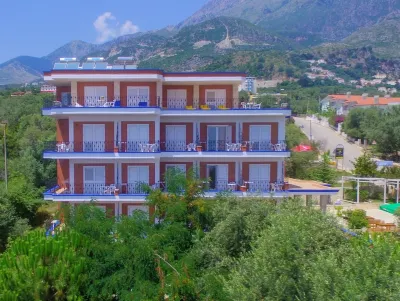 Greccia Hotel Hôtels à proximité de : Plage de Dhermi