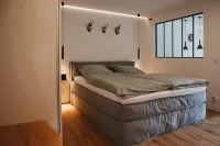 Modern Black Forest loft with mountain views - ski lift, bathing lake & thermal spa