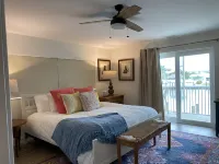 Large outdoor space with pool/hot tub, on 200ft wide canal- quick ride to Ocean!