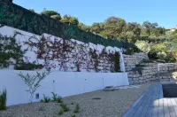 house wtih swimming pool and large garden. Sea view