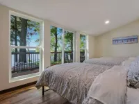 Hygge Lodge is a gorgeous lakefront gathering place for year round family fun.