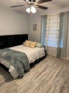 Pensacola Getaway - close to NAS & Perdido Key! Large backyard with fruit trees