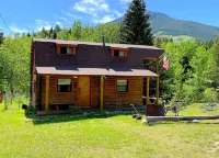 Log Cabin with Hot Tub Overlooking Rock Creek and Beartooth Mountains
