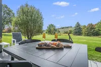 Come cozy up next to the fireplace at our contemporary condo centrally located Hotels in Cleveland Township