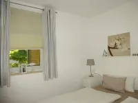 2 bedroom apt. 36 sqm swimming pool u. Sauna about 8 minutes walk z. Beach Wi-Fi