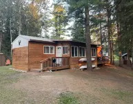 Peaceful Cabin with Boat Dock along the Black River