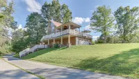 Lakehouse with covered dock, slide, and outdoor kitchen! Close to I-75, trails.
