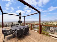 Mountain Top 4 Bdrm Home Along Nature Reserve with Spectacular Views, AC & WiFi