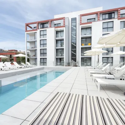 Kyrat Amarac Suites Hotels near Cala Millor Beach