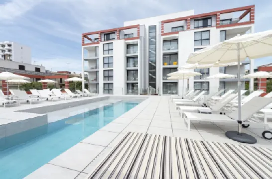 Kyrat Amarac Suites Hotels near Cala Millor Beach