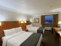 The Glenmore Inn & Convention Centre Отели рядом с достопримечательностью «Железнодорожная станция Heritage C Train»
