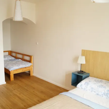 Apartmány u komína