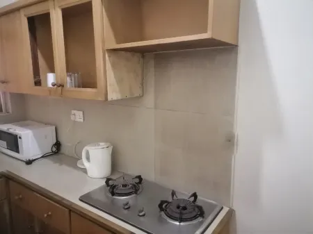 Vacation Inn Hotel Отели рядом с достопримечательностью «Университет Докса Опен в Абро Медия Кампус»