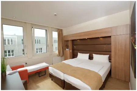 Motel Plus Berlin Отели в г. Берлин