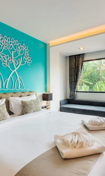 ห้องดีลักซ์เตียงคิงไซส์วิวสระว่ายน้ำพร้อมระเบียง