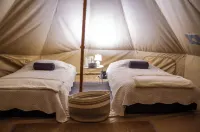 Palumbo Glamping & Villas Hôtels à : Cuniburo
