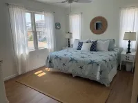 Ocean Block Spacious 5-bedroom house with central AC, Six Houses to Beach!