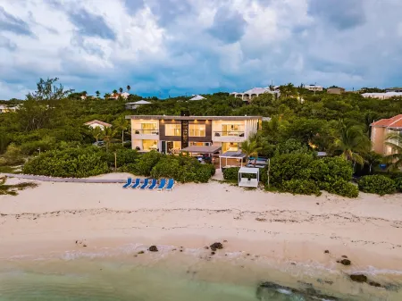 Stunning Beach Front Villa with Full Staff